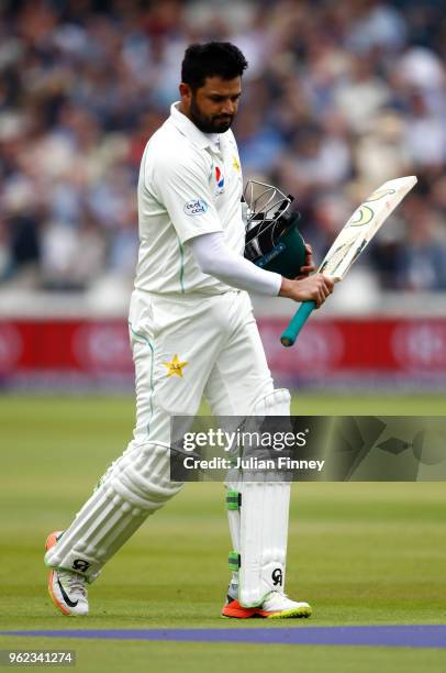 Azhar Ali of Pakistan walks off after James Anderson of England caught him LBW during day two of the 1st Test match between England and Pakistan at...