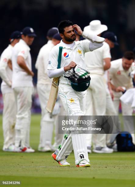 Azhar Ali of Pakistan walks off after James Anderson of England caught him LBW during day two of the 1st Test match between England and Pakistan at...