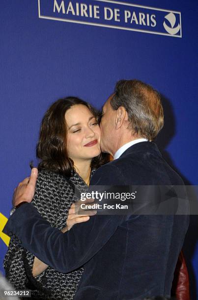 Mayor of Paris Bertrand Delanoe and Actress Marion Cotillard attend the Champs Elysees Christmas Lights Switch on Ceremony in Front of the Pub...