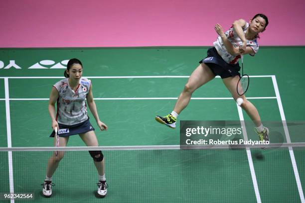 Misaki Matsutomo and Ayaka Takahashi of Japan compete against Baek Ha Na and Lee Yu Rim of Korea during the Semi-finals match on day six of the BWF...