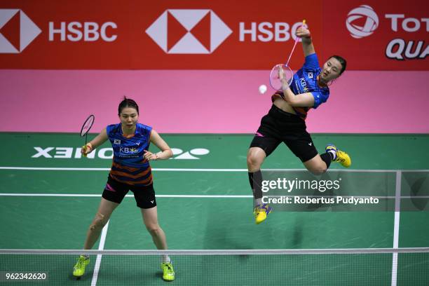 Kim So Yeong and Shin Seung Chan of Korea compete against Yuki Fukushima and Sayaka Hirota of Japan during the Semi-finals match on day six of the...