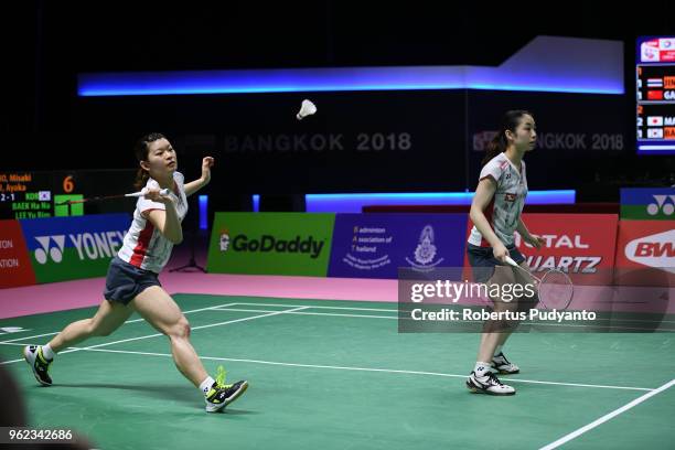 Misaki Matsutomo and Ayaka Takahashi of Japan compete against Baek Ha Na and Lee Yu Rim of Korea during the Semi-finals match on day six of the BWF...