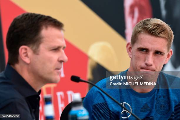 German national football team manager Oliver Bierhoff and Germany's forward Nils Petersen address a press conference at the Rungghof training center...