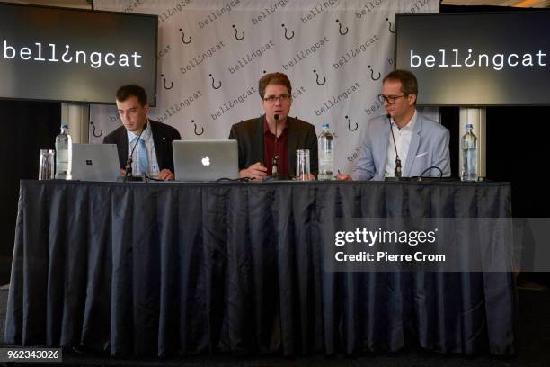 Roman Dobrokhotov from The Insider , Eliot Higgins and Moritz Rakuszitzky from the citizen journalist's organisation Bellingcat are portrayed during...