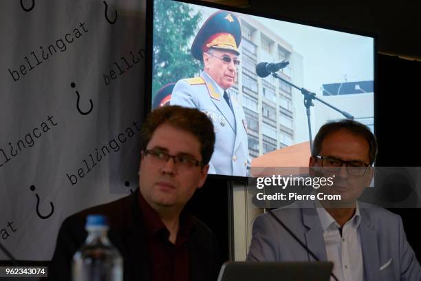 Moritz Rakuszitzky and Eliot Higgins from the citizen journalist's organisation Bellingcat name Russian officer Oleg Ivannikov as a suspect during a...