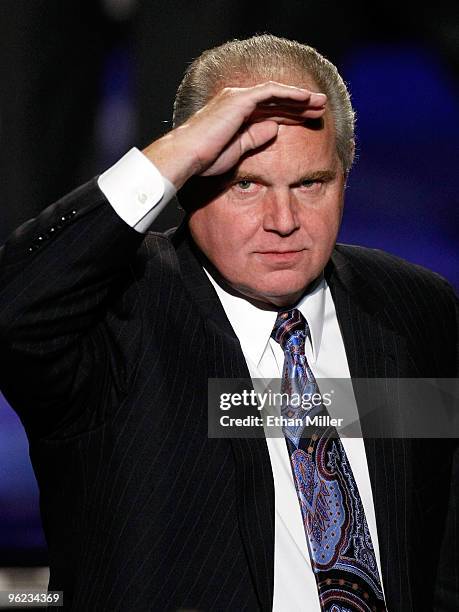 Radio talk show host and conservative commentator Rush Limbaugh salutes as he is introduced as a judge before a preliminary competition for the 2010...