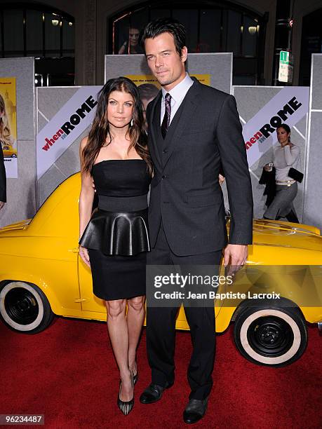 Fergie and Josh Duhamel attend the "When In Rome" Los Angeles Premiere at the El Capitan Theatre on January 27, 2010 in Hollywood, California.