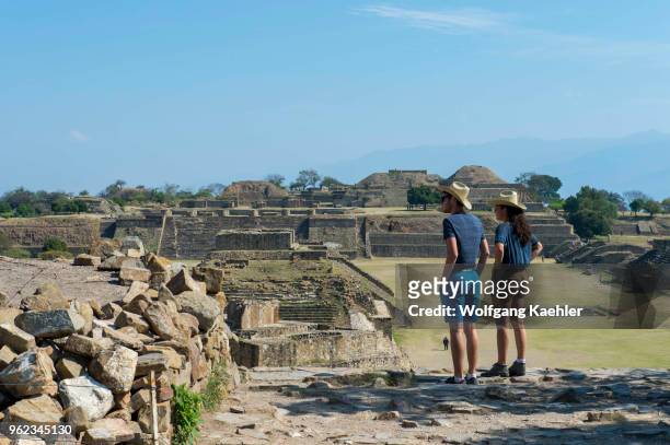 People on top of the South Platform of Monte Alban , which is a large pre-Columbian archaeological site in the Valley of Oaxaca region, Oaxaca,...