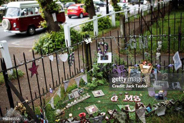 Tributes to the British musician George Michael sit outside his former home in an unofficial memorial garden in Highgate on May 25, 2018 in London,...