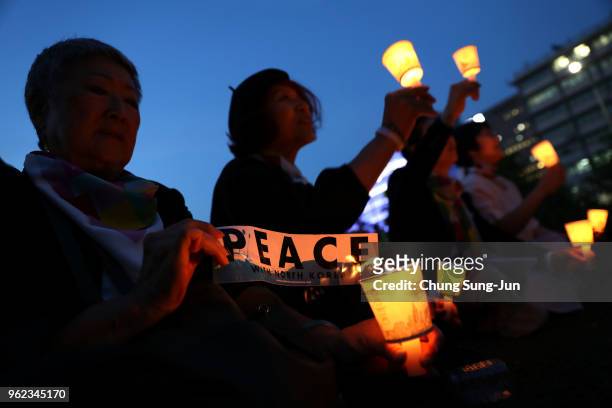Activists gather in front of the U.S. Embassy to demand peace for the Korean peninsula after the cancellation of the U.S. And North Korea summit on...