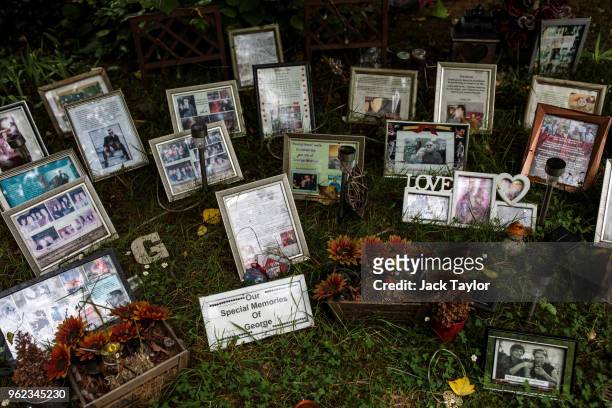 Tributes to the British musician George Michael sit outside his former home in an unofficial memorial garden in Highgate on May 25, 2018 in London,...