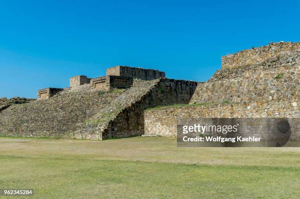 The Grand Plaza with building H of Monte Alban , which is a large pre-Columbian archaeological site in the Valley of Oaxaca region, Oaxaca, Mexico.