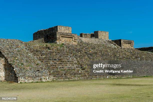 The Grand Plaza with building H of Monte Alban , which is a large pre-Columbian archaeological site in the Valley of Oaxaca region, Oaxaca, Mexico.