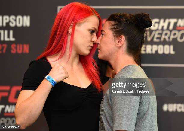 Opponents Gillian Robertson of Canada and Molly McCann of England face off during the UFC Ultimate Media Day at BT Convention Centre on May 25, 2018...