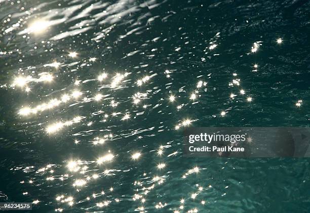 Reflections of the sun are pictured on the water as Perth moves closer to suffering the longest drought on record, with today marking 69 consecutive...