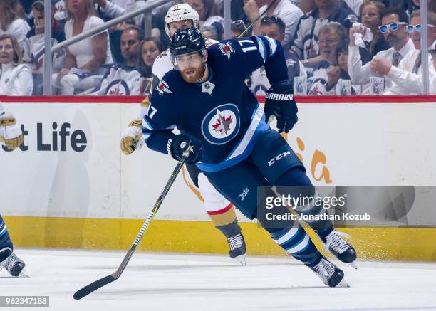 Adam Lowry of the Winnipeg Jets follows the play down the ice during first period action against the Vegas Golden Knights in Game Five of the Western...