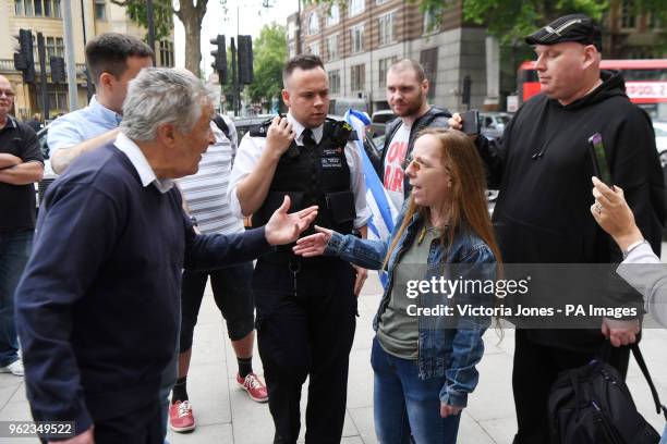 Police officers attend as arguments ensue outside Westminster Magistrates' Court, London, where Blogger Alison Chabloz of Charlesworth, Glossop,...