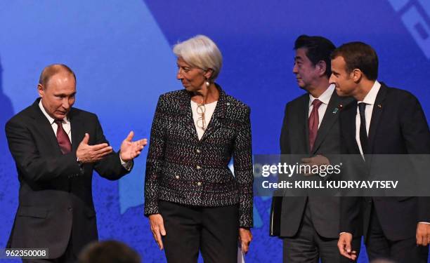 Russian President Vladimir Putin, Christine Lagarde, managing director of the International Monetary Fund , Japanese Prime Minister Shinzo Abe and...