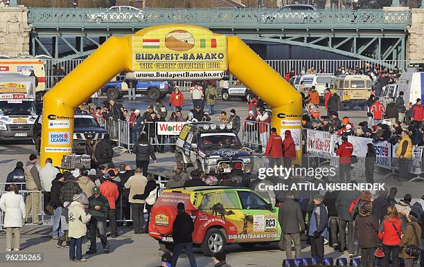 Participants take the start of the Budapest-Bamako rally in Budapest on January 16, 2010. The largest trans-Saharan amateur rally, with about 231...