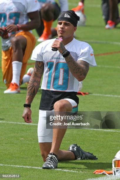 Kenny Stills of the Miami Dolphins warms up prior to the teams training camp on May 23, 2018 at the Miami Dolphins training facility in Davie,...