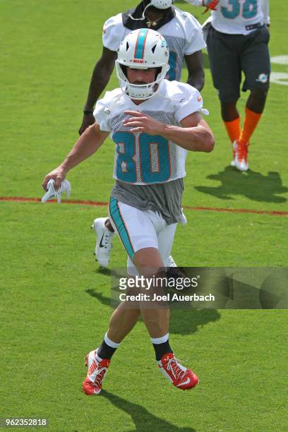 Danny Amendola of the Miami Dolphins runs a drill during the teams training camp on May 23, 2018 at the Miami Dolphins training facility in Davie,...