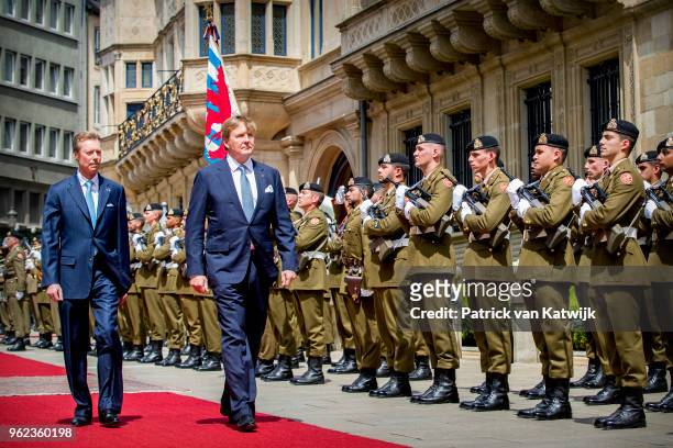 King Willem-Alexander of The Netherlands and Grand Duke Henri of Luxembourg during an official farewell ceremony at the Grand Ducal Palace of...