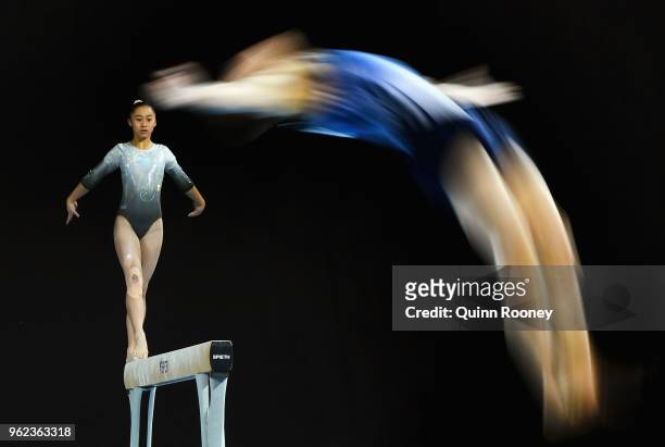 Josephine Chao of New Zealand competes on the Beam as Dylan Chapman of Victoria competes on the floor during the 2018 Australian Gymnastics...