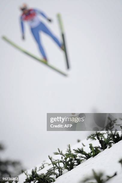 Japanese skier Kato Taihei jumps on January 17 in Chaux Neuve, eastern France, during the 13th Nordic Combined World Cup competition. AFP PHOTO /...