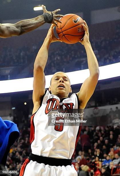 Derrick Jasper of the UNLV Rebels grabs a rebound during a game against the Air Force Falcons at the Thomas & Mack Center on January 26, 2010 in Las...