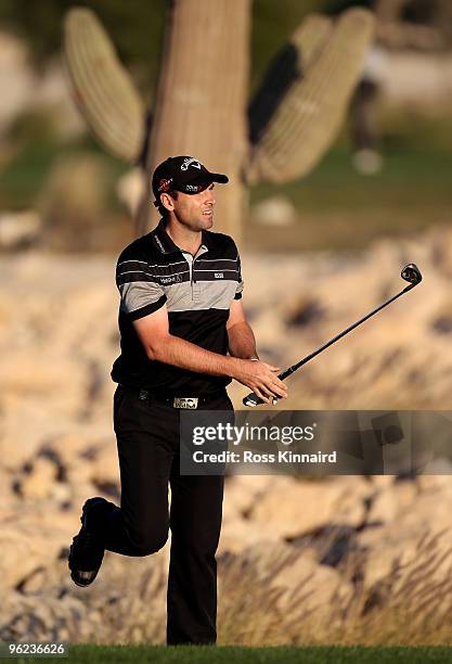 Oliver Wilson of England on the par five 18th hole during the first round of The Commercialbank Qatar Masters at The Doha Golf Club on January 28,...