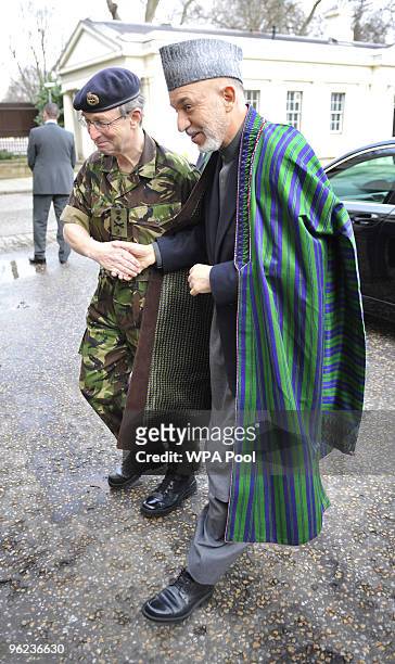 Afghan President Hamid Karzai meets Chief of the General Staff General Sir David Richards at Wellington Barracks on January 28 London, Britain....
