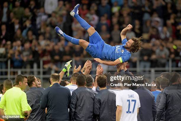 Andrea Pirlo celebrated by his teammates at the end during Andrea Pirlo Farewell Match at Stadio Giuseppe Meazza on May 21, 2018 in Milan, Italy.