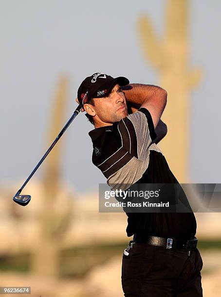 Oliver Wilson of England on the par five 18th hole during the first round of The Commercialbank Qatar Masters at The Doha Golf Club on January 28,...