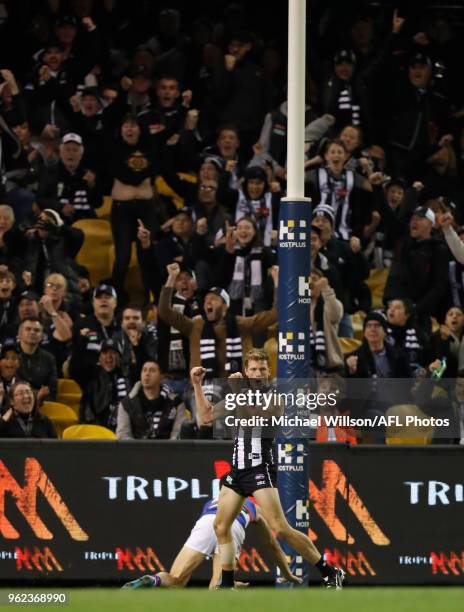 Will Hoskin-Elliott of the Magpies celebrates a goal during the 2018 AFL round 10 match between the Collingwood Magpies and the Western Bulldogs at...