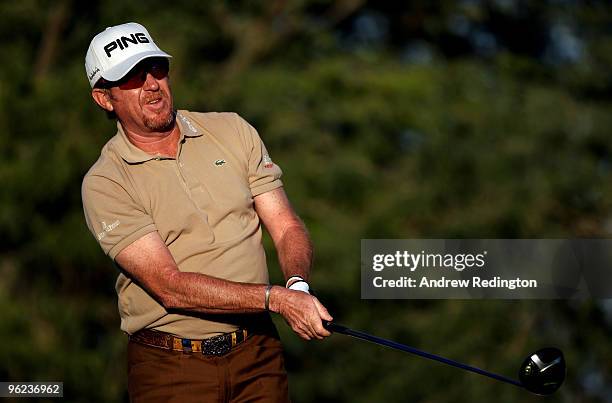 Miguel Angel Jimenez of Spain hits his tee-shot on the 18th hole during the first round of the Commercialbank Qatar Masters at Doha Golf Club on...