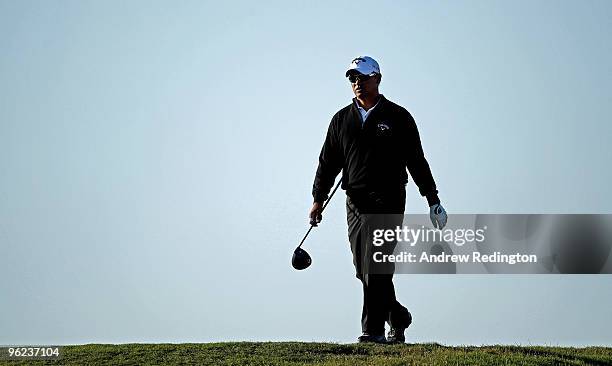 Michael Campbell of New Zealand walks towards his ball on the 16th hole during the first round of the Commercialbank Qatar Masters at Doha Golf Club...