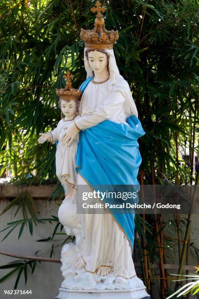 dominican community of bien hoa. mother and child statue. vietnam. - bien hoa stock pictures, royalty-free photos & images