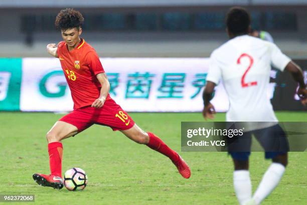 Wu Shaocong of China U19 National Team drives the ball during the 2018 Panda Cup International Youth Football Tournament between England and China at...