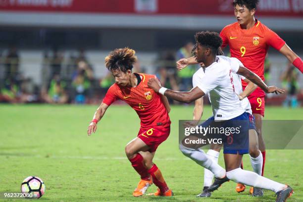 Jonathan Panzo of England U19 National Team and Yang Yilin of China U19 National Team compete for the ball during the 2018 Panda Cup International...