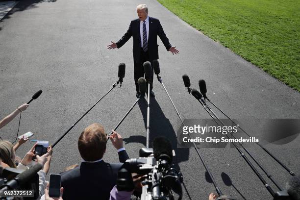 President Donald Trump talks to members of the news media before departing the White House May 25, 2018 in Washington, DC. Trump is traveling to...