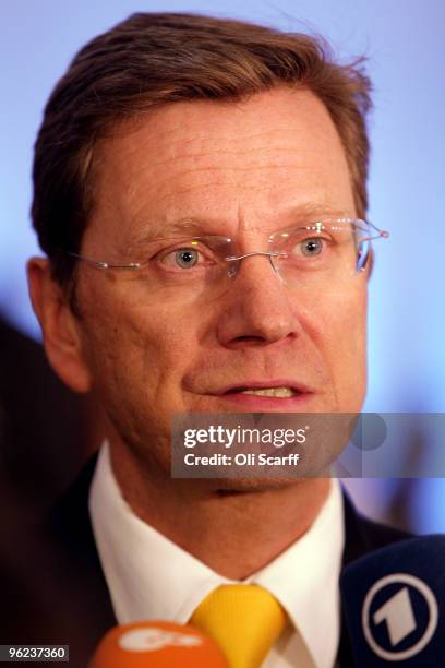 German Foreign Minister Guido Westerwelle is interviewed in the media centre at the Afghanistan London Conference on January 28, 2010 in London,...