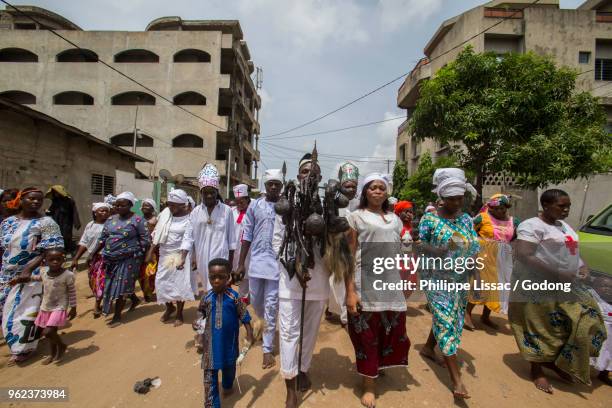 voodoo cult in cotonou, benin. procession. - animism stock pictures, royalty-free photos & images