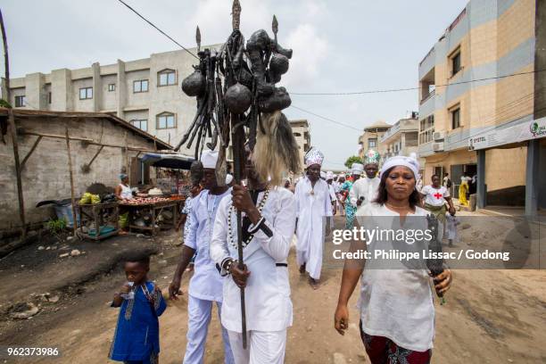 Voodoo Cult In Cotonou Benin Procession High-Res Stock Photo