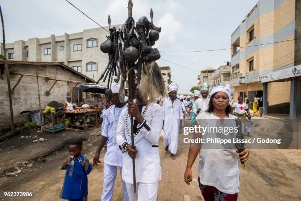 voodoo cult in cotonou, benin. procession. - animism stock pictures, royalty-free photos & images