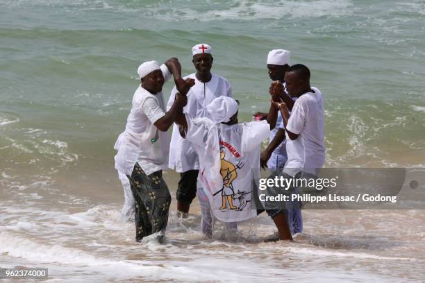 voodoo cult on a beach in cotonou, benin. - animism stock pictures, royalty-free photos & images