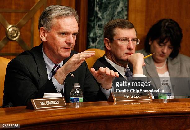 Senate Budget committee ranking member Sen. Judd Gregg questions Congressional Budget Office Director Douglas Elmendorf during a hearing about the...