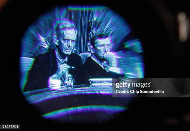 Senate Budget committee ranking member Sen. Judd Gregg and committee Chairman Kent Conrad are seen through a television viewfinder during a hearing...