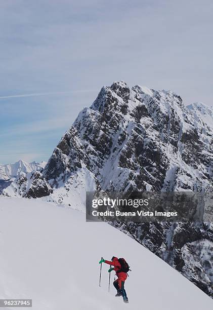 lone climber on alps - escursionismo stock pictures, royalty-free photos & images