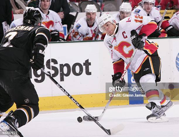 Jarome Iginla of the Calgary Flames winds up a shot against Nicklas Grossman of the Dallas Stars on January 27, 2010 at the American Airlines Center...