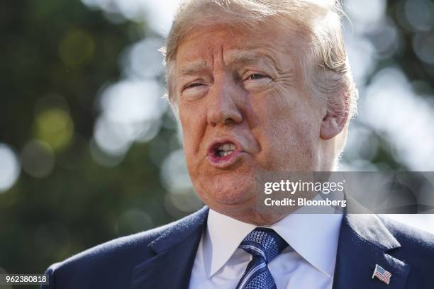 President Donald Trump speaks to members of the media before boarding Marine One while departing the White House in Washington, D.C., U.S., on...